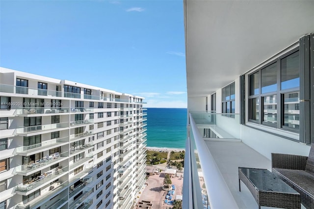 balcony featuring a water view