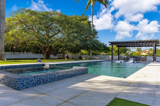 view of pool featuring an in ground hot tub and a patio area