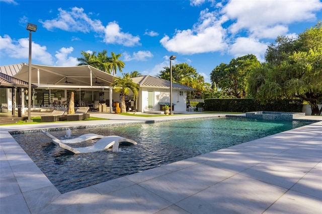 view of swimming pool featuring a patio