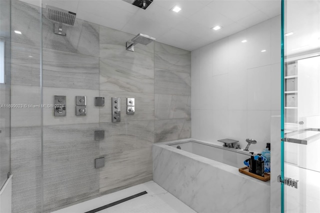 10 SW 124th Ave, Miami, FL 33184 - full bath with a garden tub, tile walls, and a tile shower