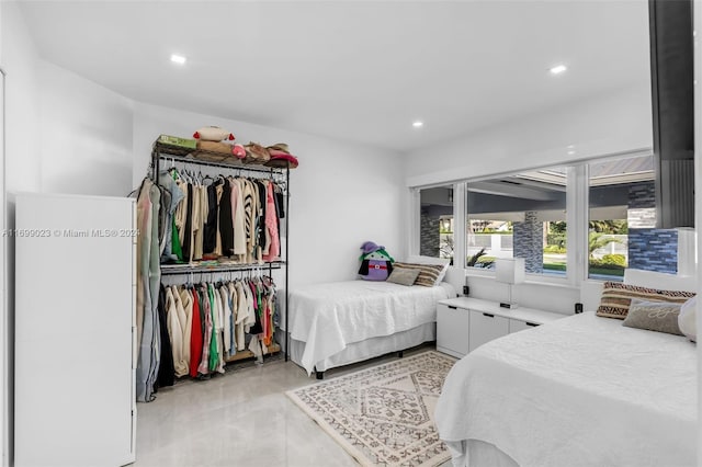 10 SW 124th Ave, Miami, FL 33184 - bedroom with recessed lighting and concrete flooring