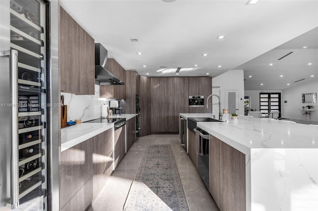 10 SW 124th Ave, Miami, FL 33184 - kitchen with modern cabinets, wall chimney exhaust hood, a sink, recessed lighting, and black appliances