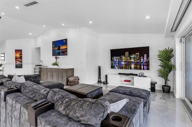 living room with lofted ceiling