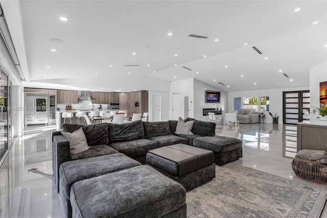 living room with lofted ceiling