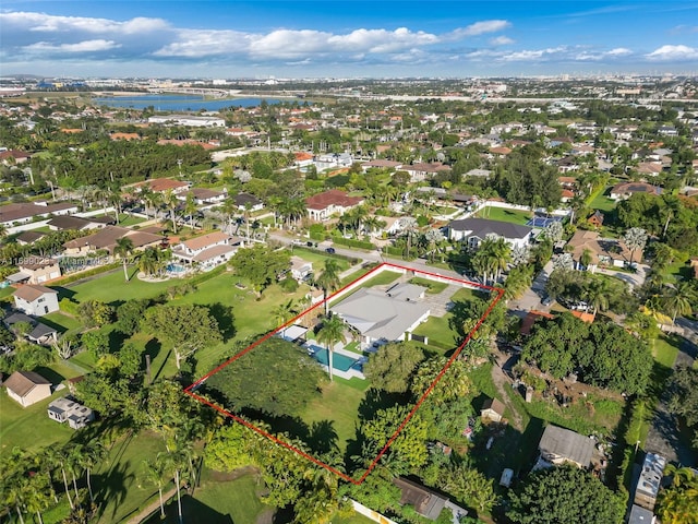 10 SW 124th Ave, Miami, FL 33184 - aerial view of residential area featuring property boundaries highlighted and a nearby body of water