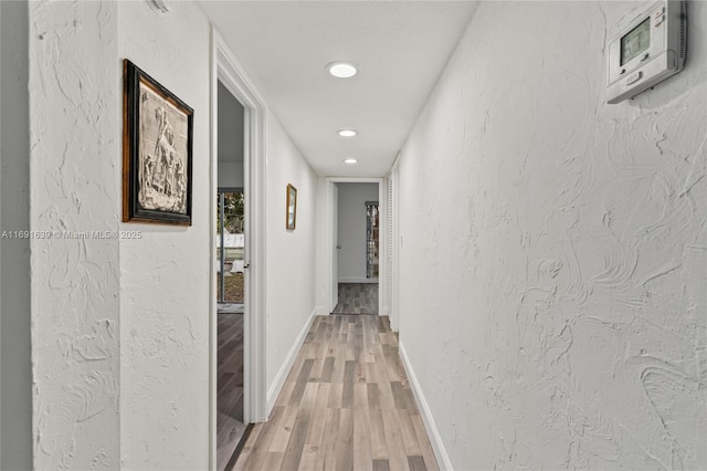 hallway featuring hardwood / wood-style floors