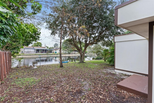 view of yard with a water view