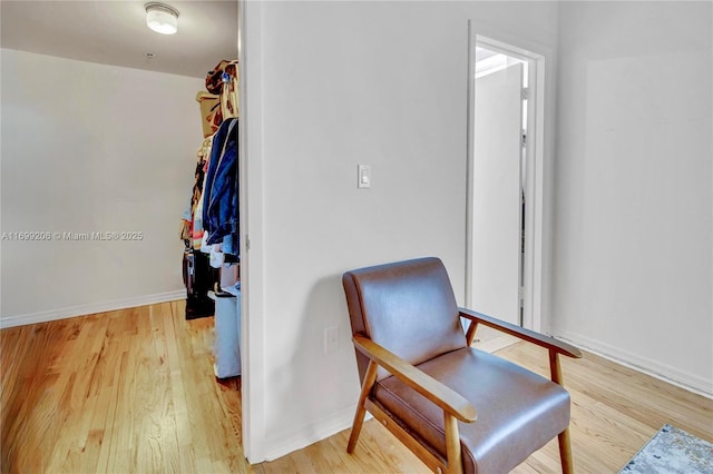 802 Euclid Ave Unit 302, Miami Beach, FL 33139 - sitting room with light wood finished floors and baseboards