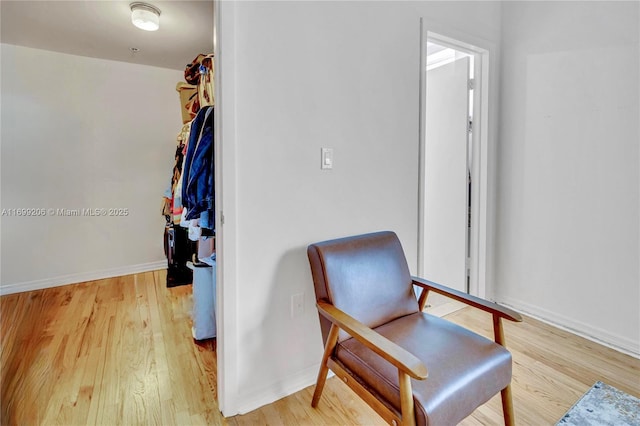 sitting room featuring hardwood / wood-style flooring