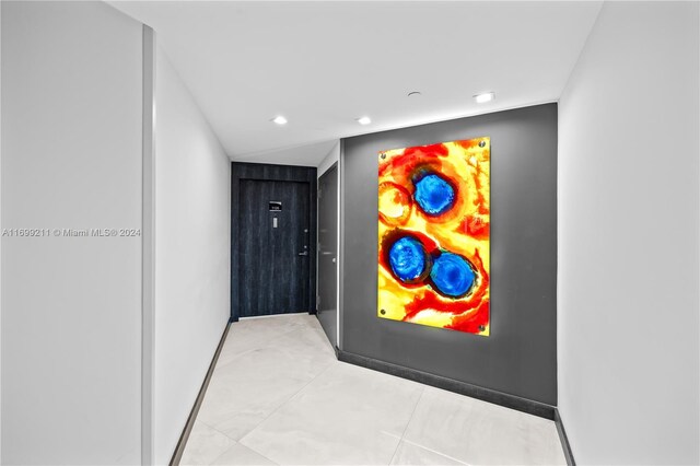 16445 Collins Ave Unit 1126, Sunny Isles Beach, FL 33160 - hall with recessed lighting, baseboards, and light tile patterned floors