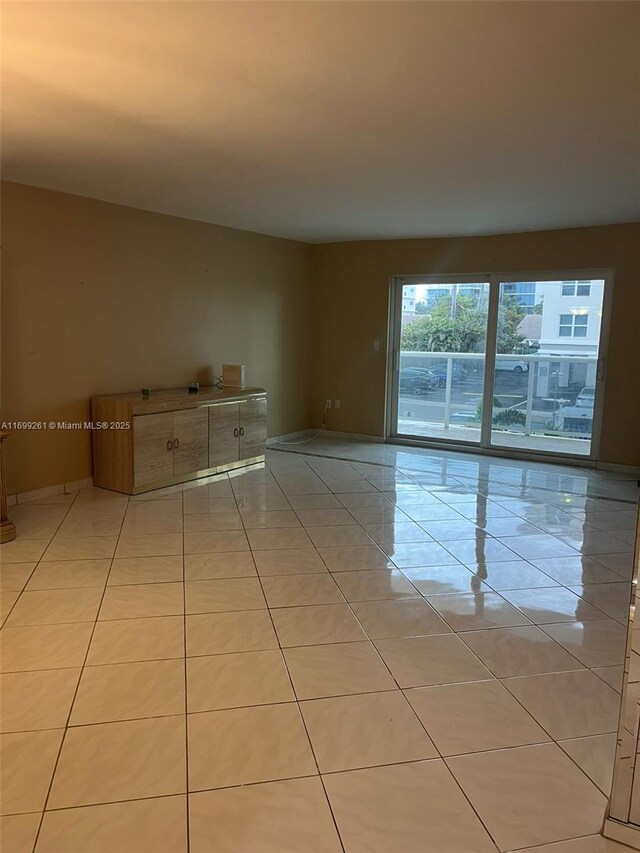 dining area with light tile patterned flooring