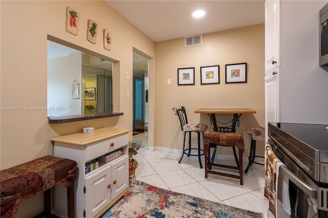 interior space with tile patterned floors