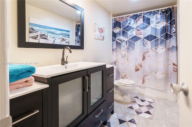 bathroom featuring tile patterned floors, curtained shower, vanity, and toilet