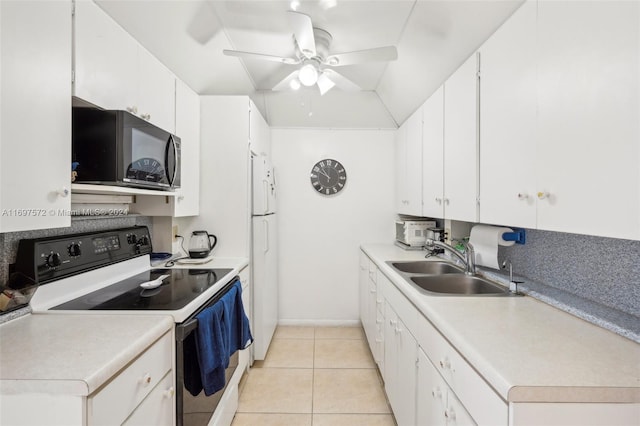 kitchen featuring white cabinetry, sink, ceiling fan, white appliances, and light tile patterned floors