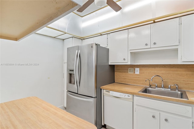 kitchen with white cabinetry, sink, stainless steel fridge with ice dispenser, backsplash, and white dishwasher