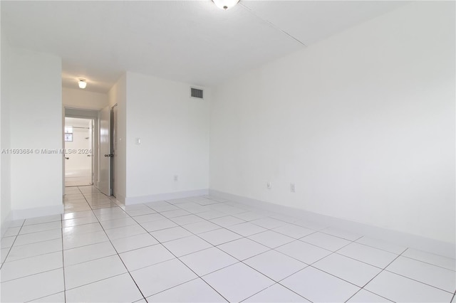 view of tiled spare room