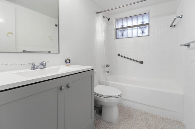 full bathroom with tile patterned flooring, vanity, toilet, and tiled shower / bath