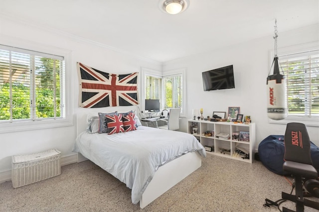 bedroom featuring crown molding