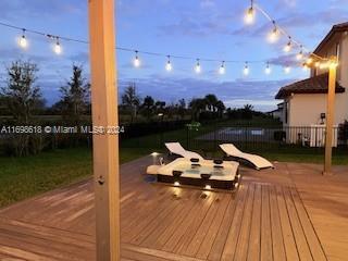 view of deck at dusk