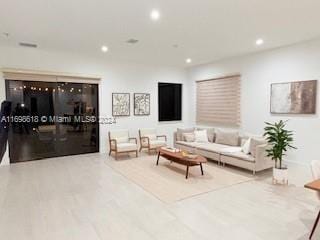 living room with hardwood / wood-style floors