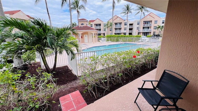 view of swimming pool with a patio area