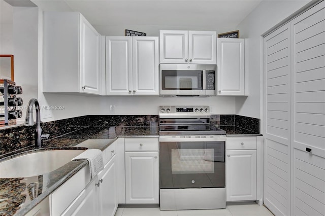 kitchen featuring white cabinets and stainless steel appliances