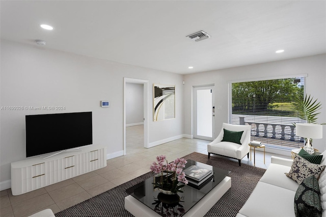 3241 NE 17th Ave, Oakland Park, FL 33334 - living area featuring recessed lighting, tile patterned flooring, and baseboards