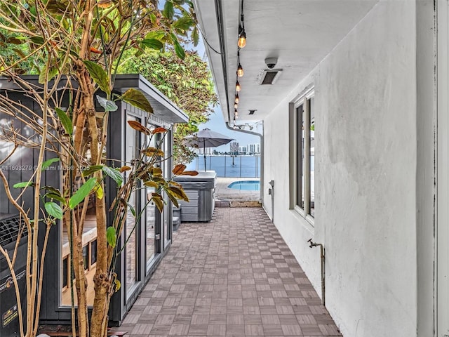 view of patio featuring a water view