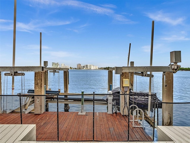 dock area with a water view