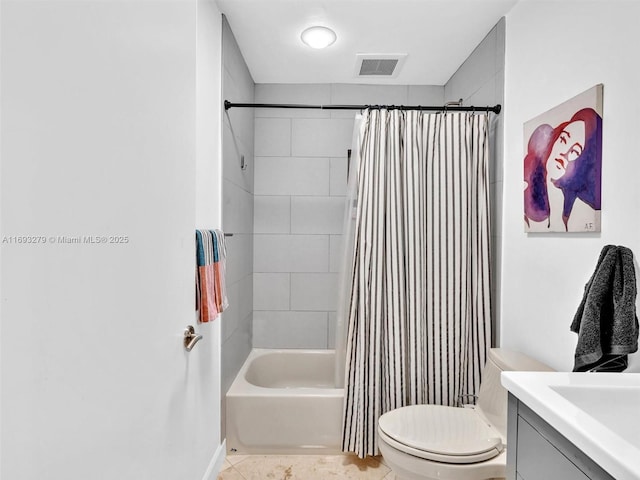 full bathroom featuring tile patterned floors, vanity, shower / bath combination with curtain, and toilet