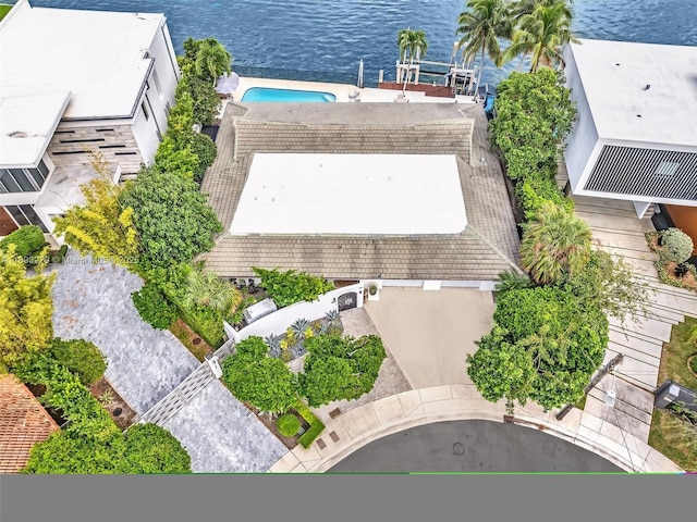 birds eye view of property featuring a water view