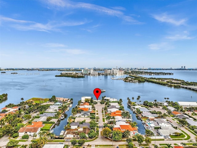 bird's eye view with a water view