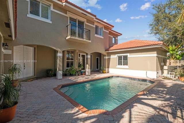 rear view of house with a patio