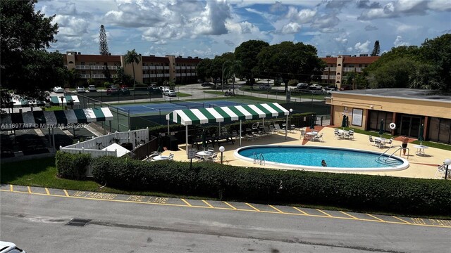 view of pool featuring a patio area