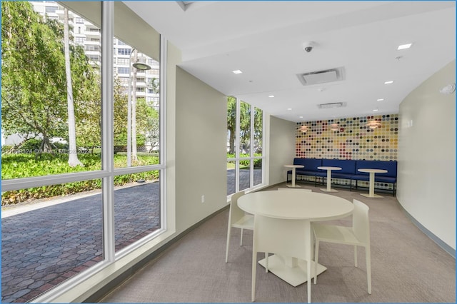 dining area with light carpet