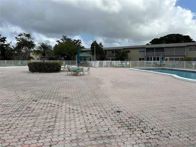 view of swimming pool featuring a patio