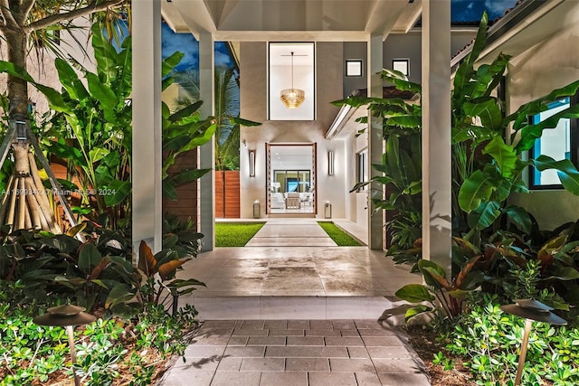 property entrance featuring a patio