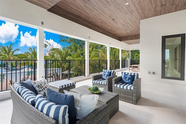 view of patio / terrace with a balcony and outdoor lounge area