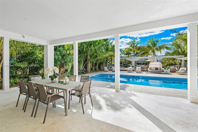 view of swimming pool with a patio area