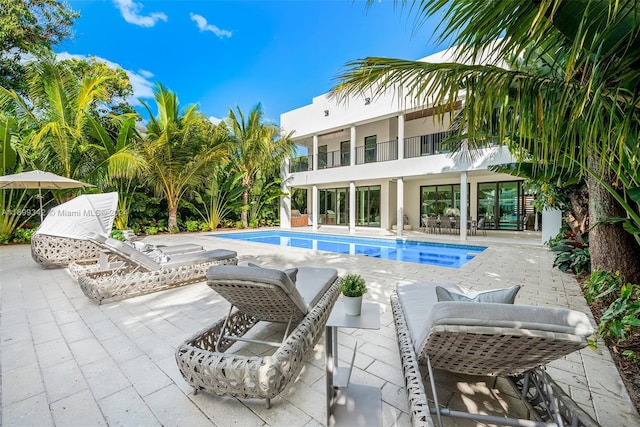 view of pool featuring a patio area