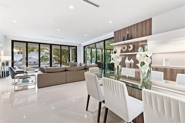 dining room with a wall of windows