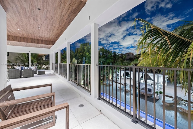 balcony with an outdoor hangout area