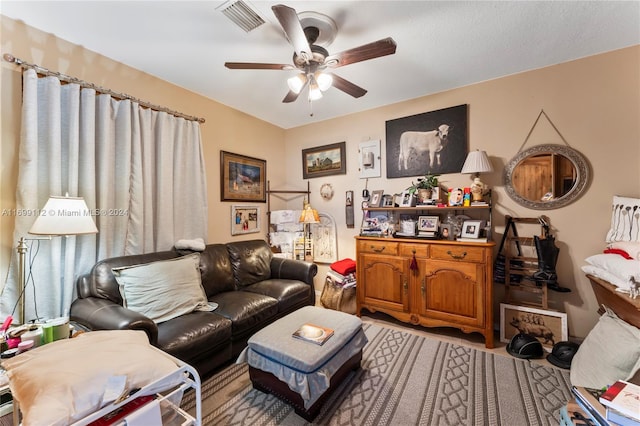 living room featuring ceiling fan