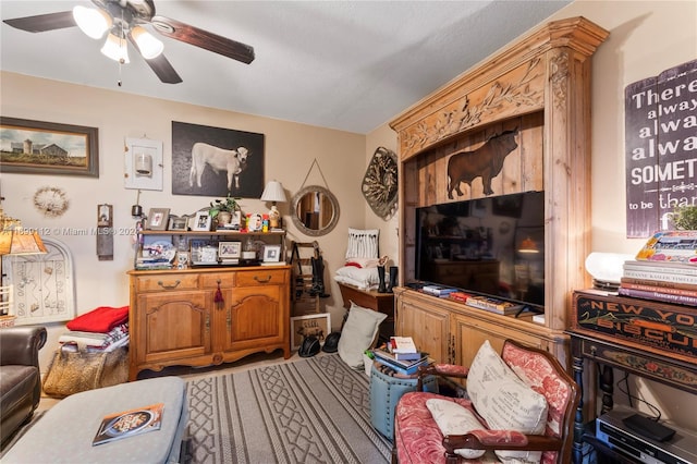 living room featuring ceiling fan