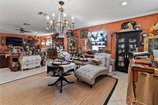 tiled dining room featuring ceiling fan with notable chandelier and ornamental molding