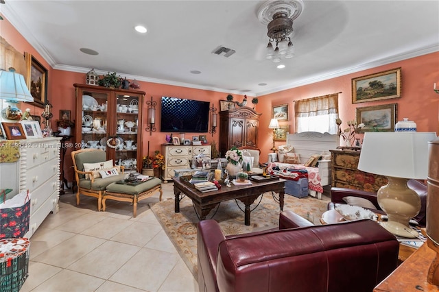 living room featuring ceiling fan, crown molding, and light tile patterned flooring