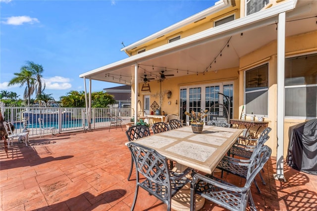 view of patio / terrace featuring a fenced in pool