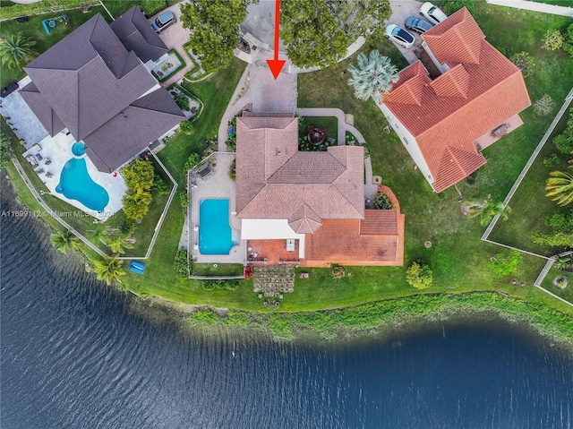 drone / aerial view featuring a water view