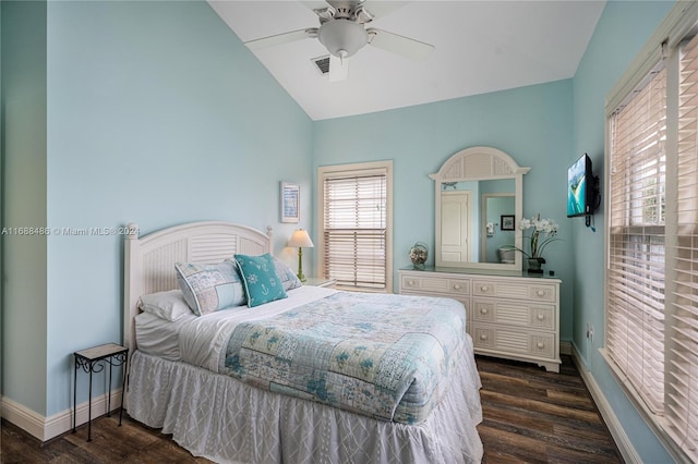 bedroom with dark hardwood / wood-style floors, ceiling fan, and lofted ceiling