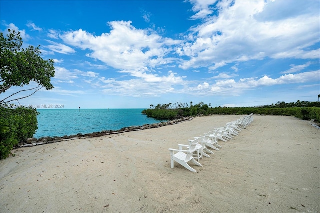 property view of water featuring a view of the beach